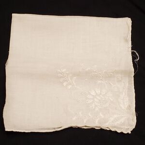 Antique hankie with beautiful threadwork detail. Old very fragile.